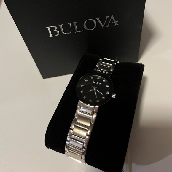 Silver Bulova watch with black face - Picture 2 of 7